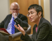Nobel Peace Prize winner, journalist, and author Maria Ressa talking while sitting in a chair.