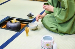Professor Hirata uses a small bamboo scoop called a chashaku to prepare the powdered matcha tea.