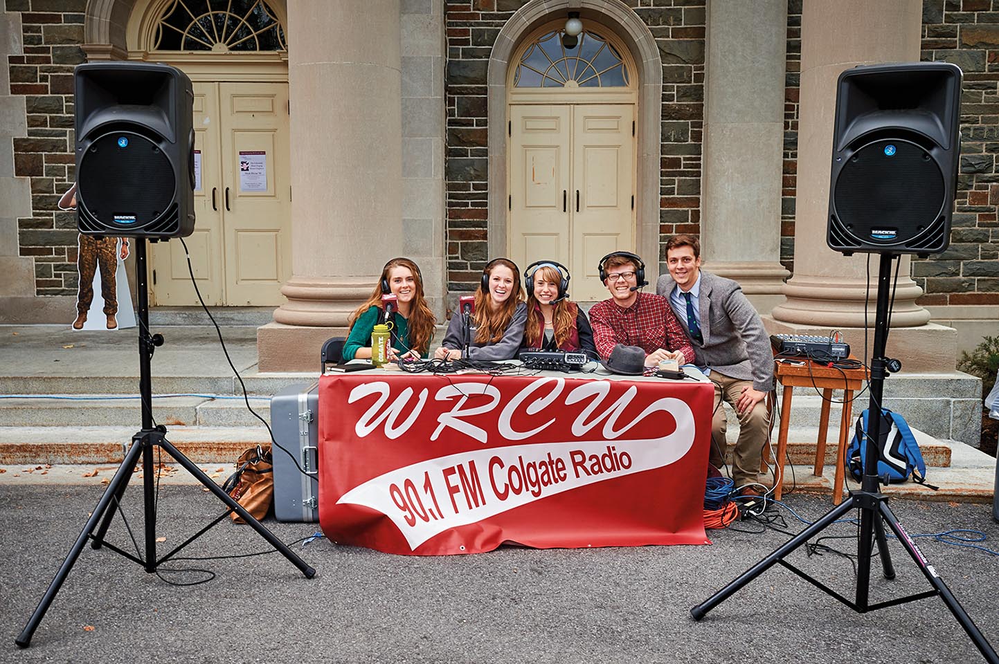 Sportelli (second from left) and other DJs provide music for Homecoming 2014.