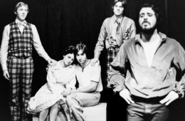 Cast of The Fantasticks pose in a black and white photo