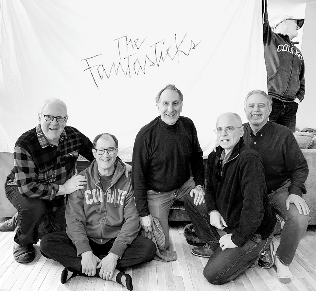 The Fantasticks pose in black and white photo