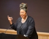 Professor Tracey Hucks ’87, MA’90 speaks at the podium