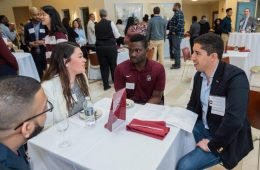 John Paul Ortiz '10 discusses business with students at a Mosaic Weekend event