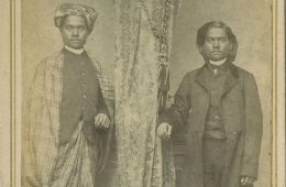 Mirror image of Moung Kyaw in traditional Burmese clothing and western clothing, circa 1865