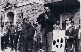 Bill Robinson, Class of 1969, speaks during rally, 1968