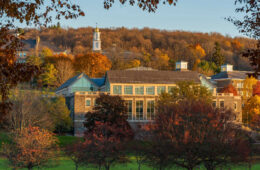 View of Case-Geyer Library and campus hill in autumn