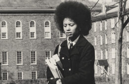 Rae Scott-Jones in 1970, carrying books on the Academic Quad