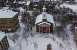 Aerial view of Memorial Chapel and academic quad in the snow