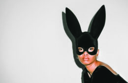 Leiya Salis modeling a black mask over her eyes with tall animal ears