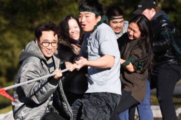 Students pull a rope in a tug-of-war match