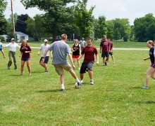 Faculty and students play soccer