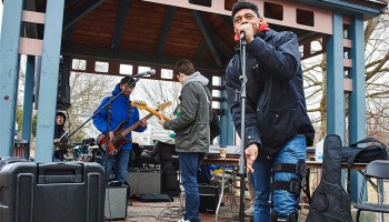 Students give musical performance on the Hamilton Village Green