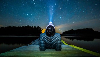 Kaitlin Abrams ’18 in the Thousand Islands gazing at the stars while wearing a headlamp
