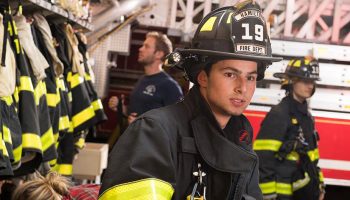 Student volunteer firefighters gear up for a call