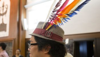 Karl Louis Uy ’16 sports a Colgate fedora with six colorful feathers