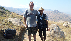 Gary Martenson ’95 in Madagascar’s Andringitra National Park with a porter.