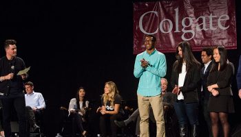 Student entrepreneurs on stage for a shark tank