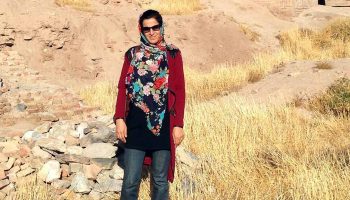 Naseema Noor ’06 in dry Afghanistan landscrap