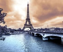 Artistic photo of the Eiffel Tower over the Seine