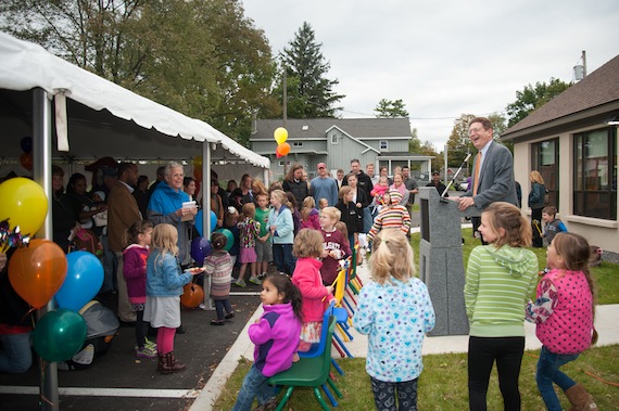 President Herbst helps to open the new wing at the Chenango Nursery School.