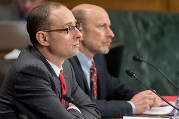 Professor Chad Sparber sits at a table while giving testimony to the Senate Subcommittee on Immigration and the National Interest