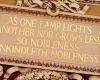 Sign on LOC wall that reads "As one lamp lights another, nor grows less, so nobleness enkindleth nobleness.