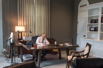 President Brian W. Casey works at the desk in his office