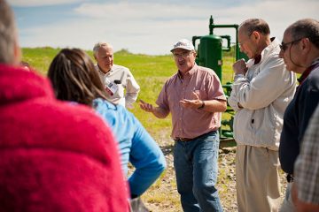 Bruce W. Selleck, Thomas A. Bartlett Chair and Professor of Geology, tours a local natural gas well with alumni during Reunion 2011.